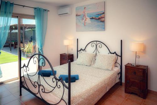 A bed or beds in a room at Villa Molly88
