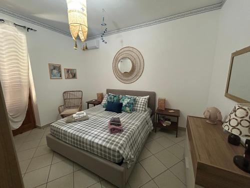 Ένα ή περισσότερα κρεβάτια σε δωμάτιο στο Terrazza SoleLuna
