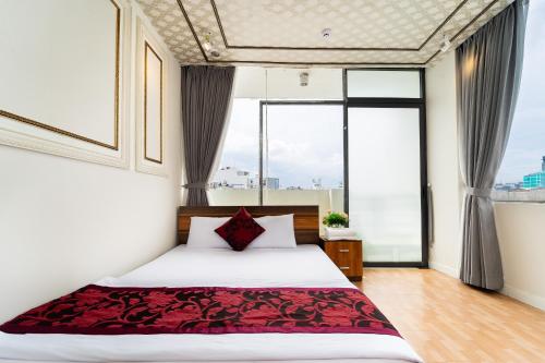 Ένα ή περισσότερα κρεβάτια σε δωμάτιο στο Kings Hotel In City Central