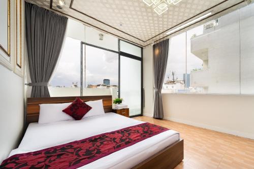 Ένα ή περισσότερα κρεβάτια σε δωμάτιο στο Kings Hotel In City Central