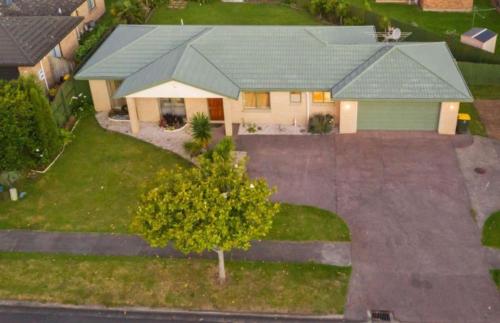 an overhead view of a house with a tree at Best aboard on Chapel Road in Auckland
