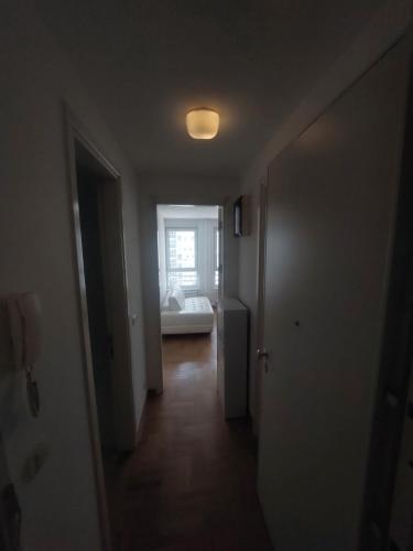 Ένα ή περισσότερα κρεβάτια σε δωμάτιο στο DELTA CITY Apartment