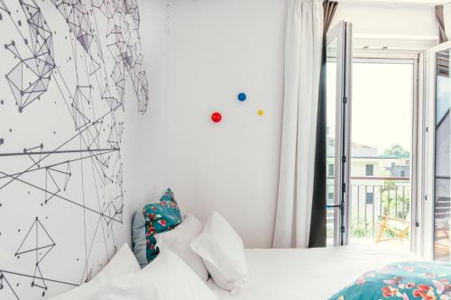 Letto o letti in una camera di SK Active hotel - ex Garni Hotello