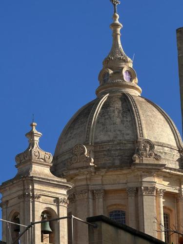 a building with a dome on top of it at Traditional Holiday Home in the Heart of Nadur in Nadur