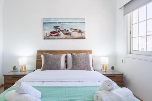 En eller flere senge i et værelse på Destiny 1-Bedroom Apartment