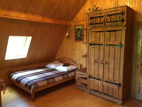 Postel nebo postele na pokoji v ubytování Sykytura