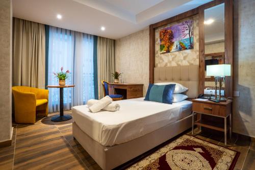 Katil atau katil-katil dalam bilik di Hotel Ain benian