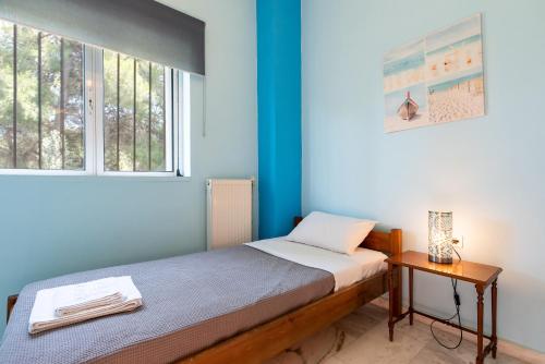 Katil atau katil-katil dalam bilik di Pyramisa House Free Shuttle From And To Athens Airport