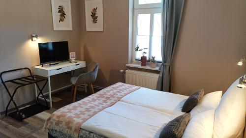 TV a/nebo společenská místnost v ubytování Hotel Bodethal