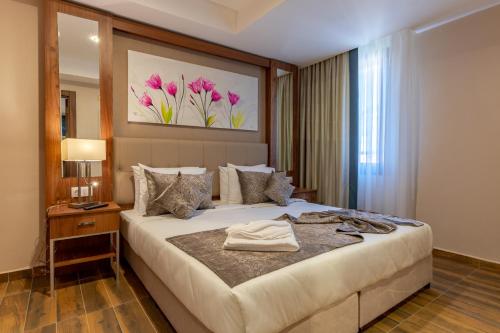 Katil atau katil-katil dalam bilik di Hotel Ain benian