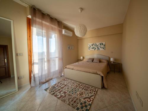 Postel nebo postele na pokoji v ubytování Casa KALI