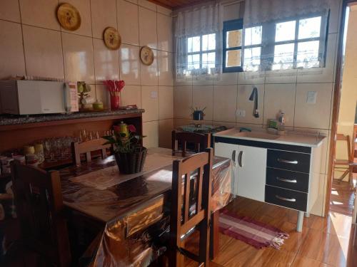 Kuchyň nebo kuchyňský kout v ubytování Casa de Boneca