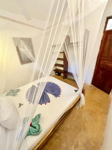 Letto o letti in una camera di HEBE Bungalows Lodge