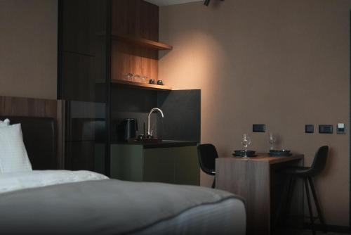 Η κουζίνα ή μικρή κουζίνα στο Five Apartments