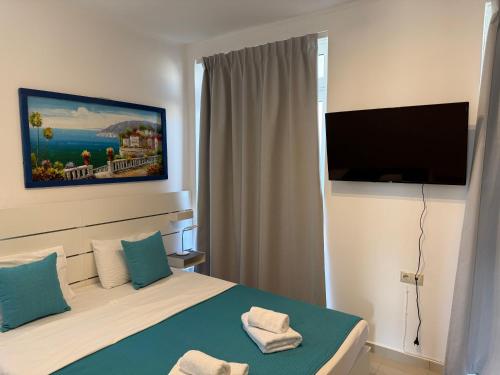 TV a/nebo společenská místnost v ubytování Apartment 7M, Lagada Resort