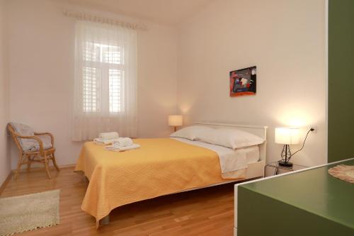 Postel nebo postele na pokoji v ubytování Apartment Toncika