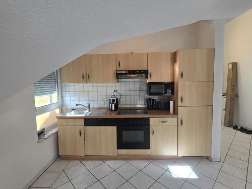 Kuchyň nebo kuchyňský kout v ubytování Wohnung- ideal für Kurz- und Langzeitmiete