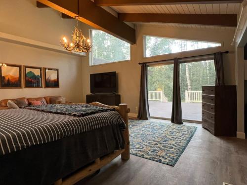 Postel nebo postele na pokoji v ubytování Massive Cabin Ski in Ski Out and Games