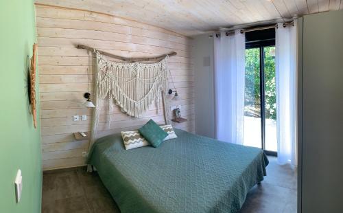 Postel nebo postele na pokoji v ubytování CASA JEANATA