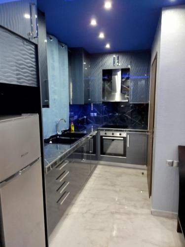 Una cocina o cocineta en MESAGGALA PALACE No10