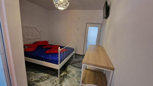 Postel nebo postele na pokoji v ubytování New House Philip