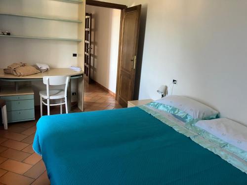 Ένα ή περισσότερα κρεβάτια σε δωμάτιο στο Appartamento Piazza di Montese 1