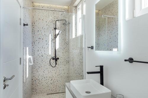 a bathroom with a shower and a toilet and a sink at *NEW IN 2025* - Hotel Subra Atrium in Herceg-Novi
