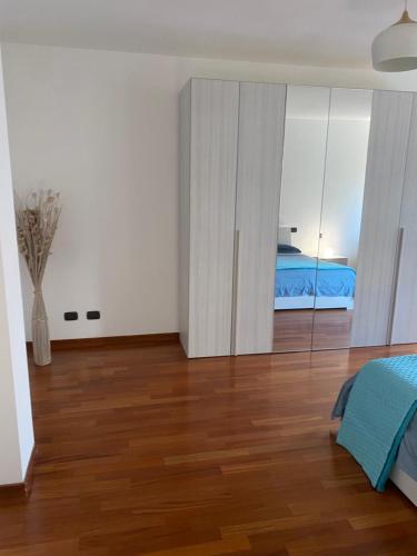 Ένα ή περισσότερα κρεβάτια σε δωμάτιο στο Casa Fiumara,Aeroporto,Aquario Genova