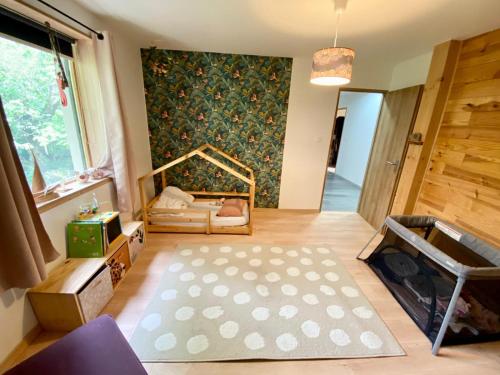 Ένα ή περισσότερα κρεβάτια σε δωμάτιο στο Chalet Kameleo