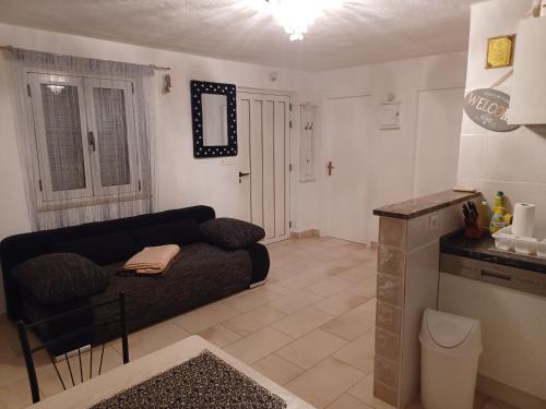 Posezení v ubytování Apartment in Villa Tamara -Pool beheizt ,Meerblick