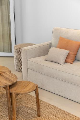a living room with a couch and a table at Sorobon Bay Hotel in Kralendijk