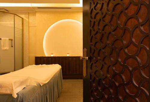 Ένα ή περισσότερα κρεβάτια σε δωμάτιο στο The Eclipse Boutique Suites