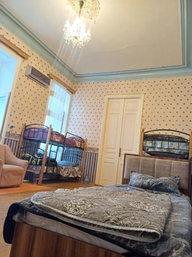 Ένα ή περισσότερα κρεβάτια σε δωμάτιο στο Al Khaleej Hostel