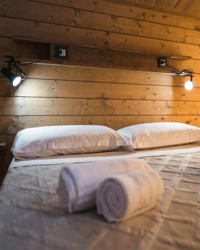 Postel nebo postele na pokoji v ubytování Agriturismo Poggio Nardini