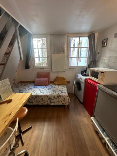 Cuina o zona de cuina de Petit Duplex Centre Ville