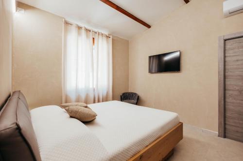 Postel nebo postele na pokoji v ubytování Resort Ombreseda