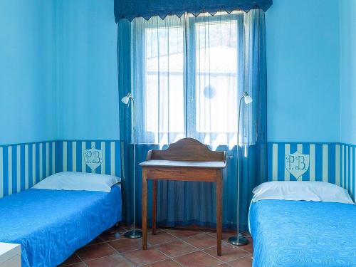 Ein Bett oder Betten in einem Zimmer der Unterkunft Casa Ponte Ballerino