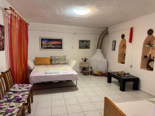 Cama o camas de una habitación en VunoSunsetHouse
