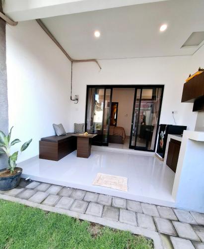Ruang duduk di Wisman House by Pigeon