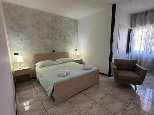 Ένα ή περισσότερα κρεβάτια σε δωμάτιο στο Hotel Il Gabbiano