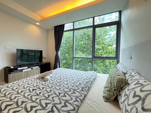 Postel nebo postele na pokoji v ubytování Central Living Ploenchit