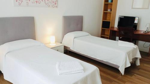 Ένα ή περισσότερα κρεβάτια σε δωμάτιο στο Le Dimore del Golfo