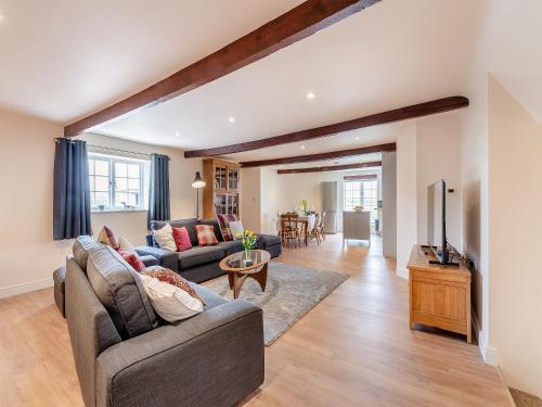 a living room with two couches and a tv at Oast View - Uk43088 in Preston
