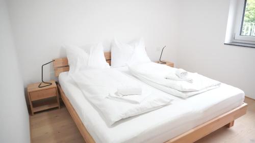 Rosengarten Apartmentsにあるベッド