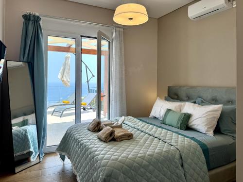 Postel nebo postele na pokoji v ubytování Villa Menta