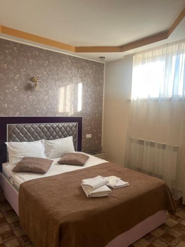 Postel nebo postele na pokoji v ubytování Narek+