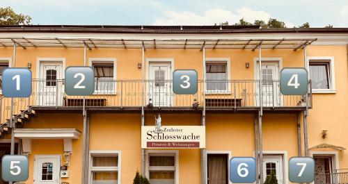 a building with numbers on the side of it at Schlosswache21 in Zerbst