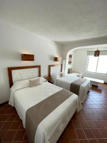 Кровать или кровати в номере Hotel Aldea del Bazar & Spa