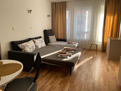 A bed or beds in a room at Amel -new luxury apartment close to the beach