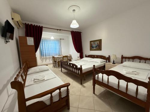 Postel nebo postele na pokoji v ubytování GuestHouse NOVI
